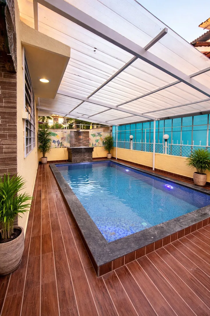 Outdoor private pool seating area at Namo Villa Retreat